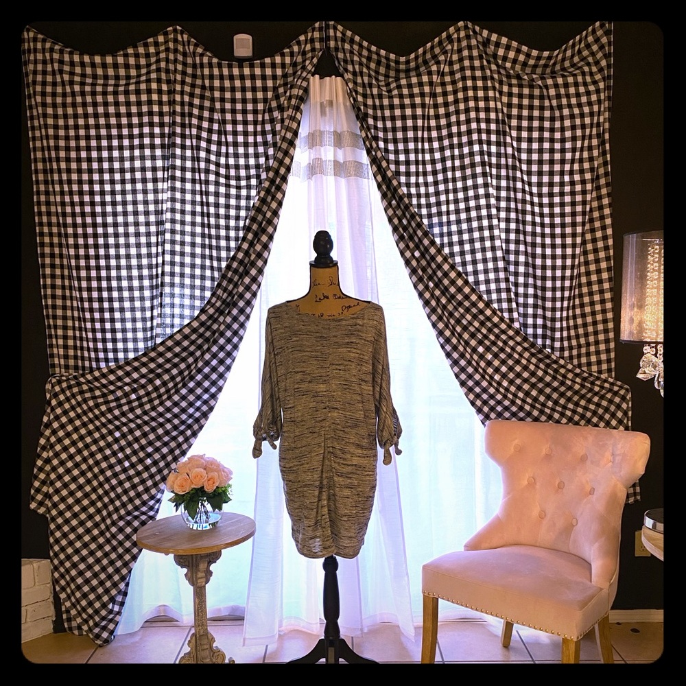 Woman’s gray monochrome grays dress.